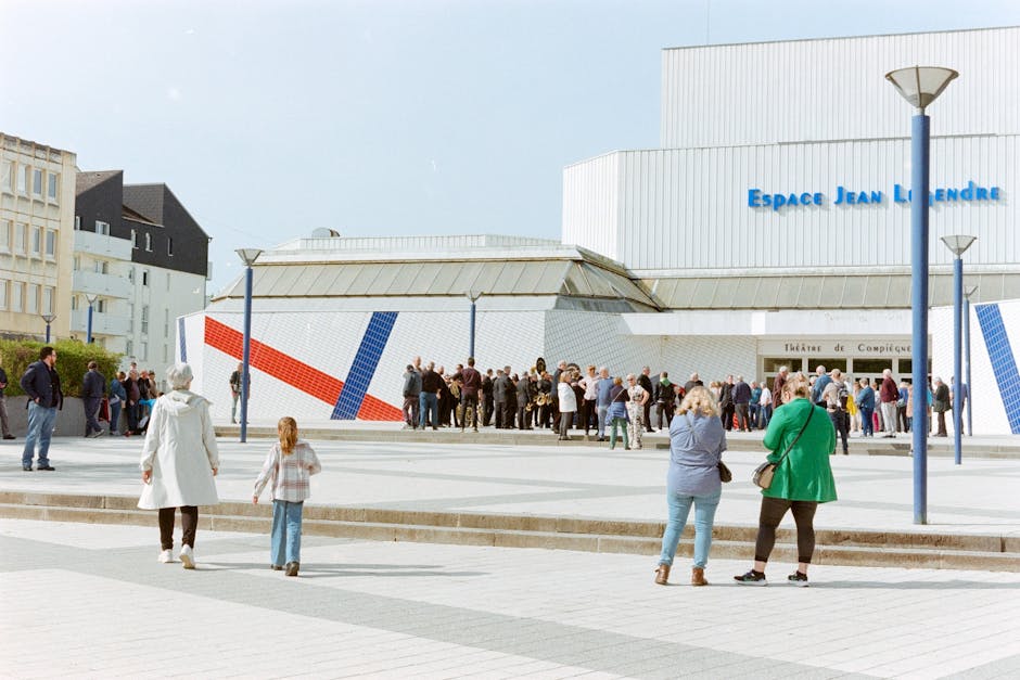 Crowd gathered at Espace Jean Legendre Theater in Compiegne, France.